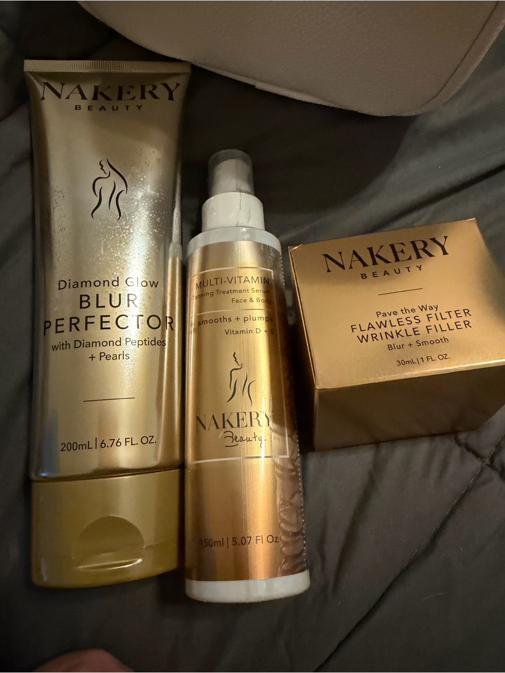Nakery Set of Three Full Size Brand New Products in an Obagi Makeup Bag